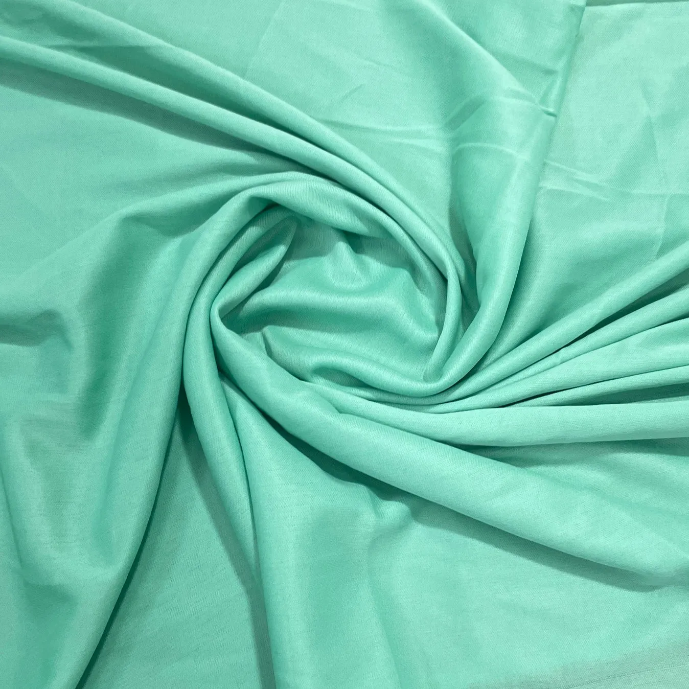 Light Mint Green Solid Lycra Dyed Fabric