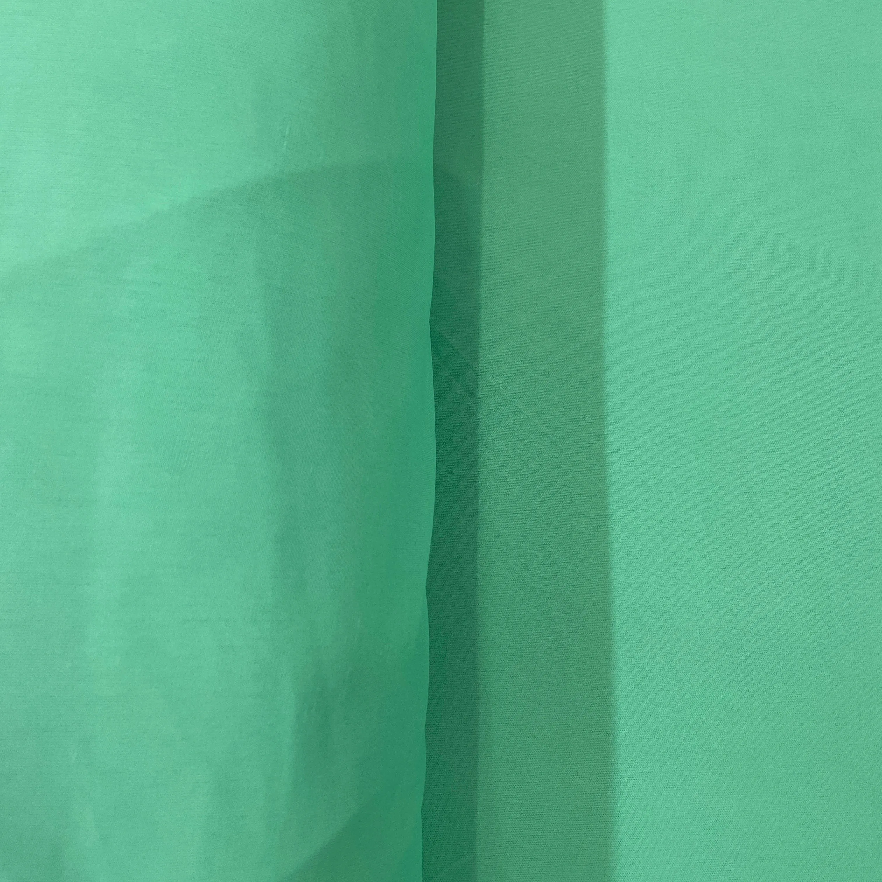 Mint Green Solid Lycra Dyed Fabric