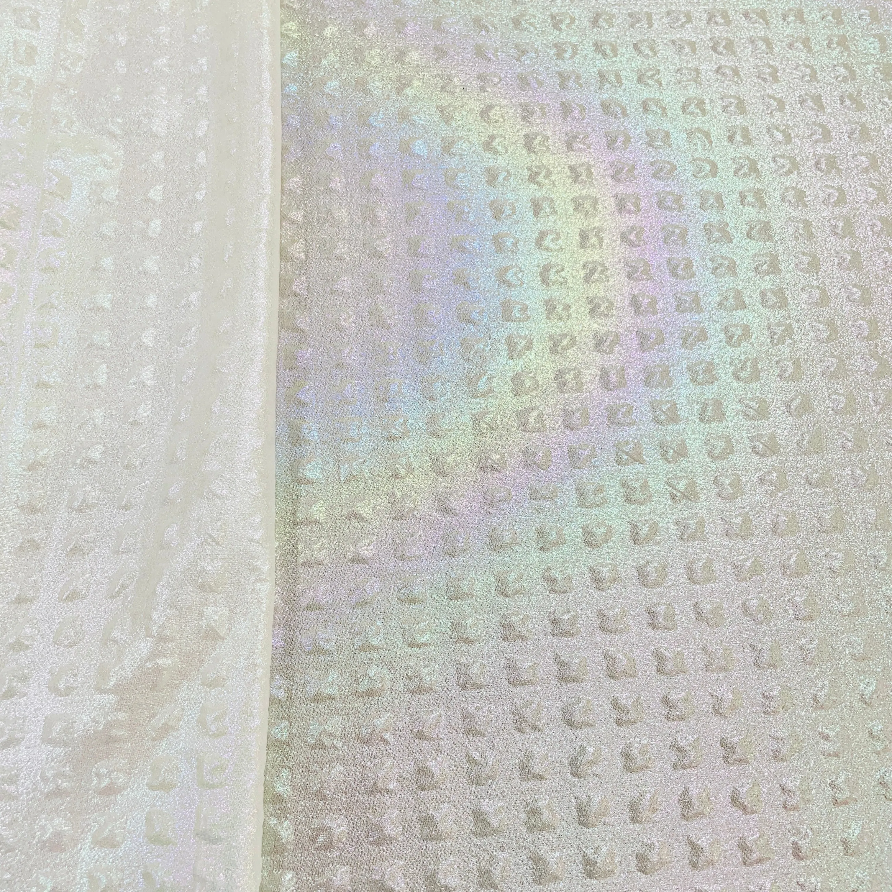 White Solid Imported 3D Rainbow Embrossed Knitted Lycra Fabric